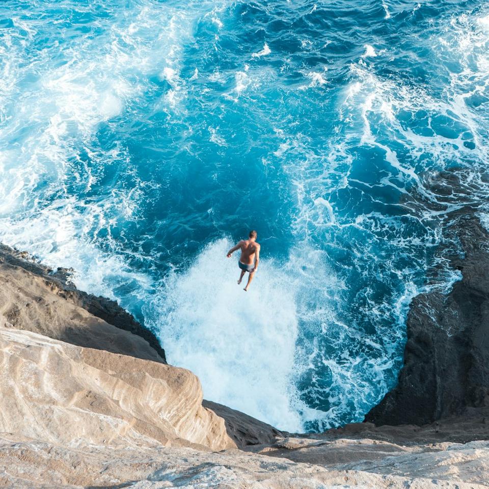 A scary image of a person jumping into a LOT of water